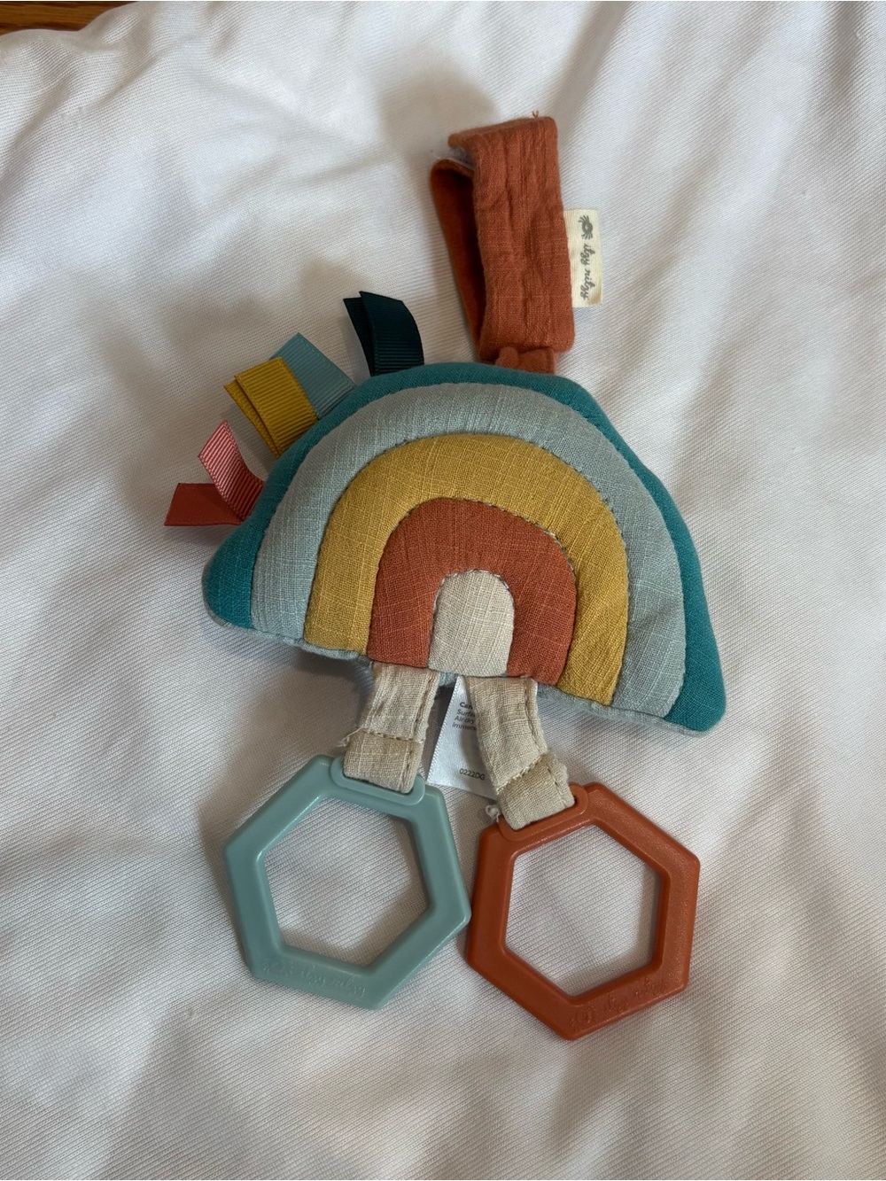 Itzy Ritzy Rainbow Teether Toy in Teal, Mustard & Rust